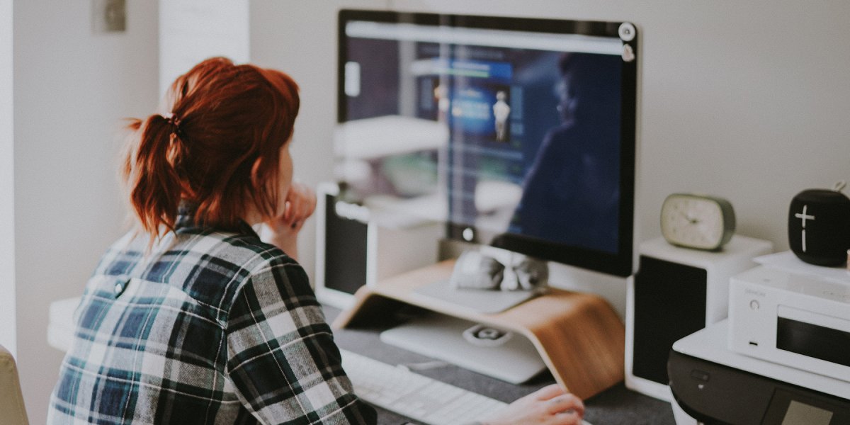 Woman in front of computer screen