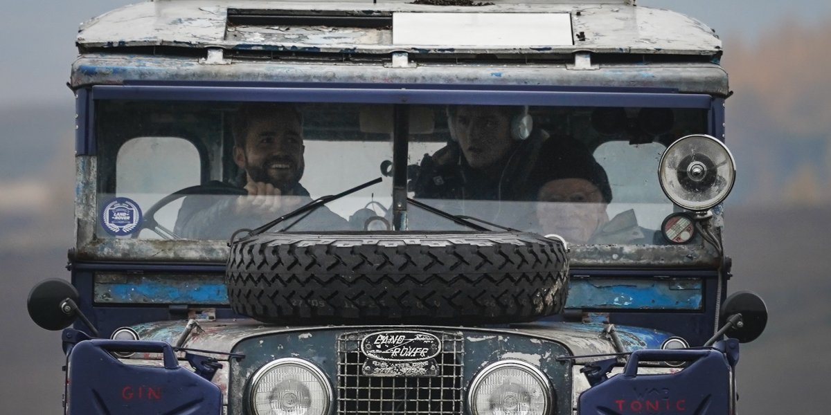 Alex Bescoby behind the wheel and Tim Slessor in the passenger seat