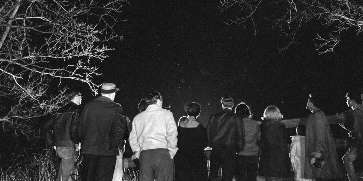 People watching lights in the sky