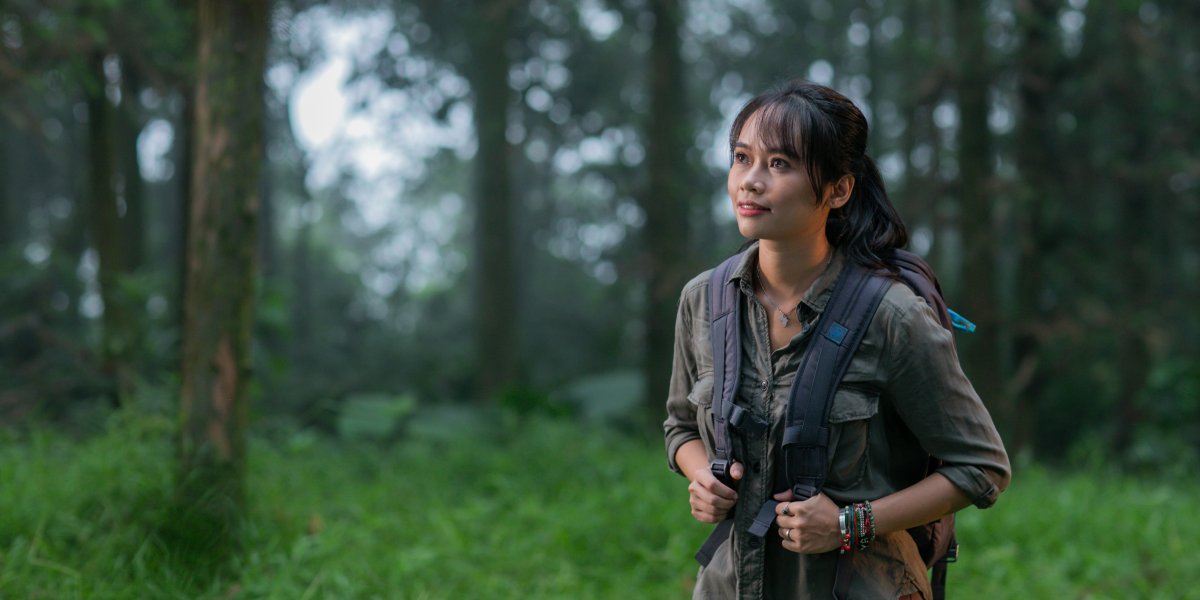 Trang Nguyen in a forest