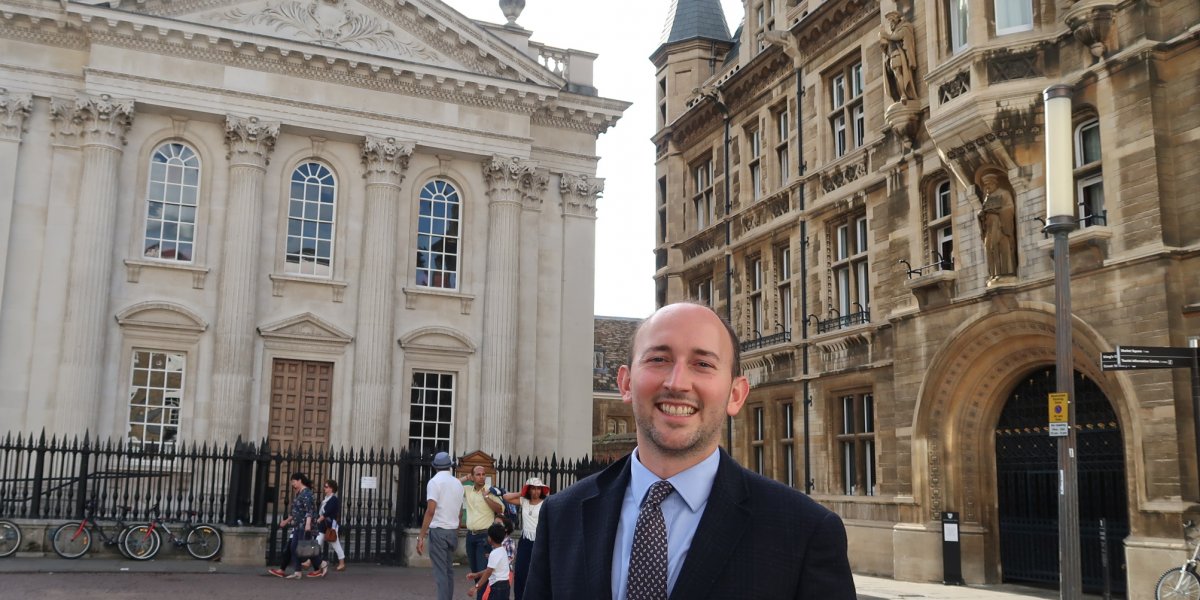 Sam Sudar in front of the Senate House