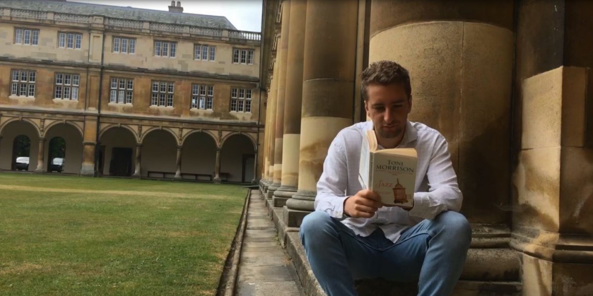 Tom Chamberlain reads in Trinity College grounds