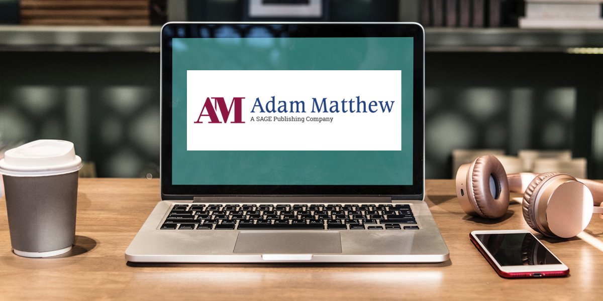 Laptop with Adam Matthew logo on the screen