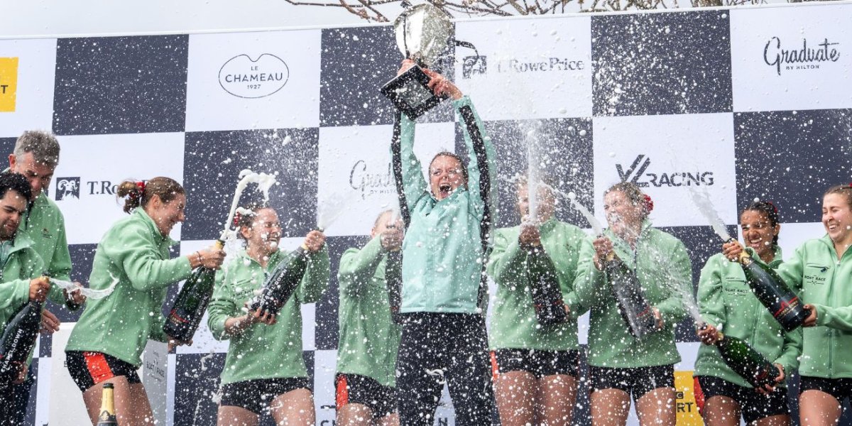 Blue Boat crews celebrate on the podium after winning The Boat Race 2025