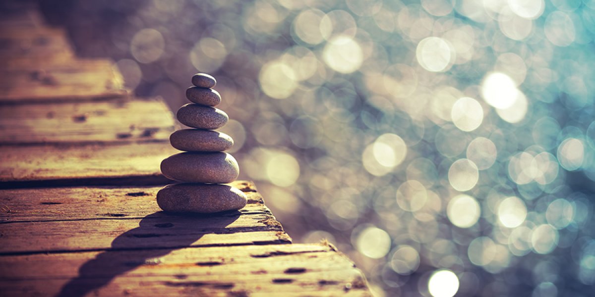 Inner peace and balance, pile of pebbles on the wooden bridge on the beach, summer vacation on the spa resort, life and harmony 