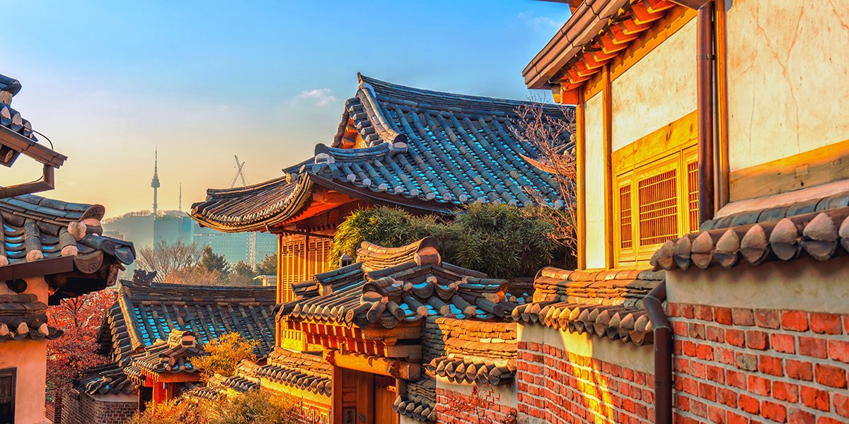 View of Bukchon Hanok village with the sun setting