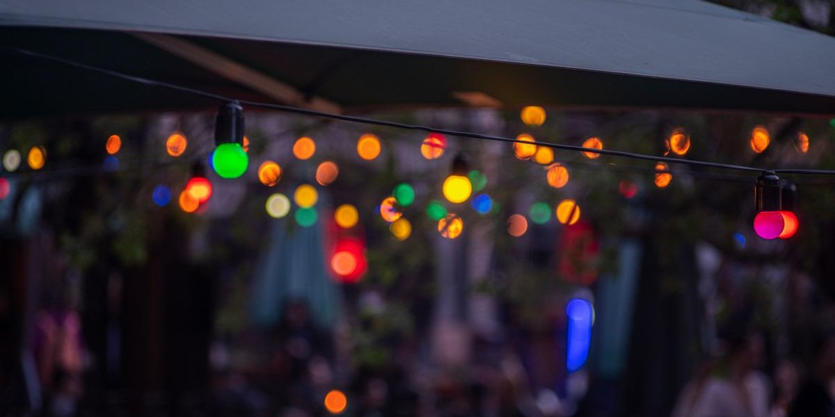 Multicoloured lights shine in the night sky