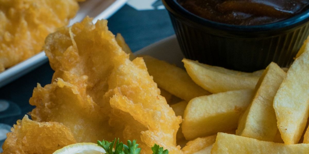 Battered fish with chips on a plate