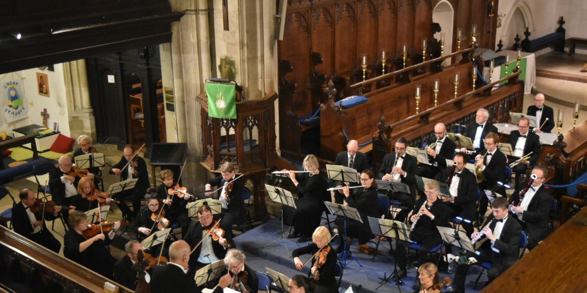 Orchestra inside Great St Mary's