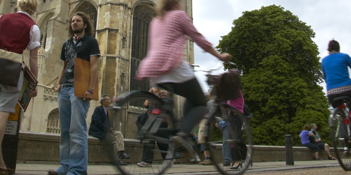 Students cycling in front of King's