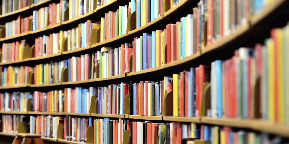 Rounded library shelves full of books