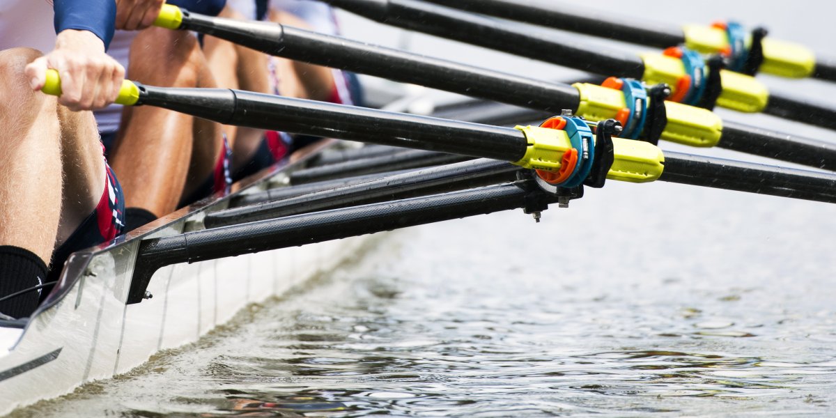 A team of rowers on a river