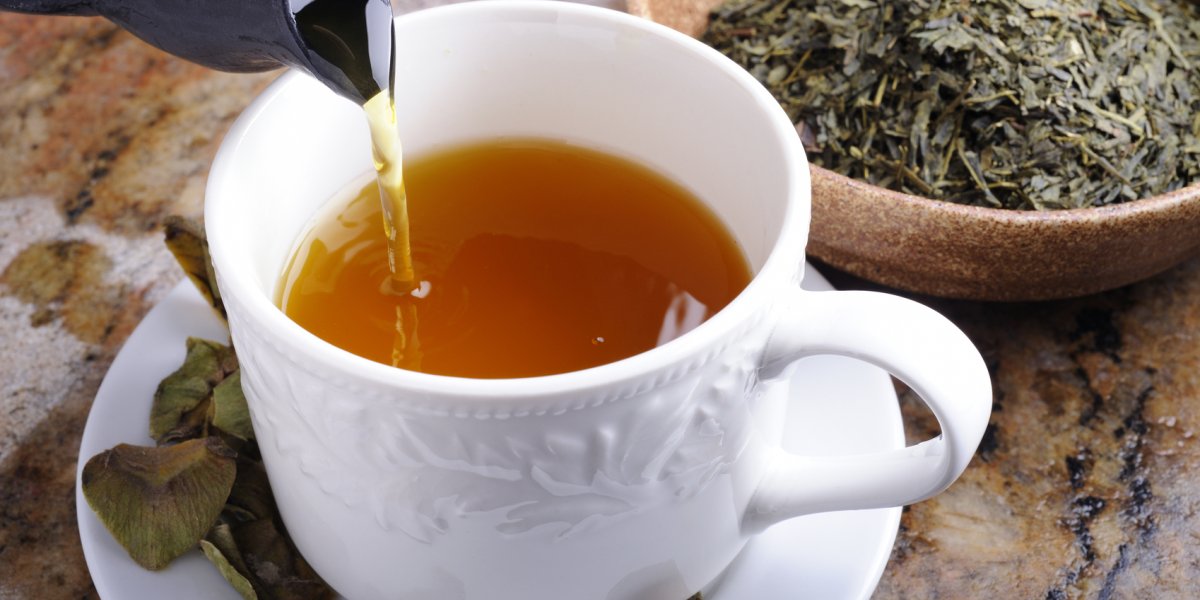 A cup of tea being poured 
