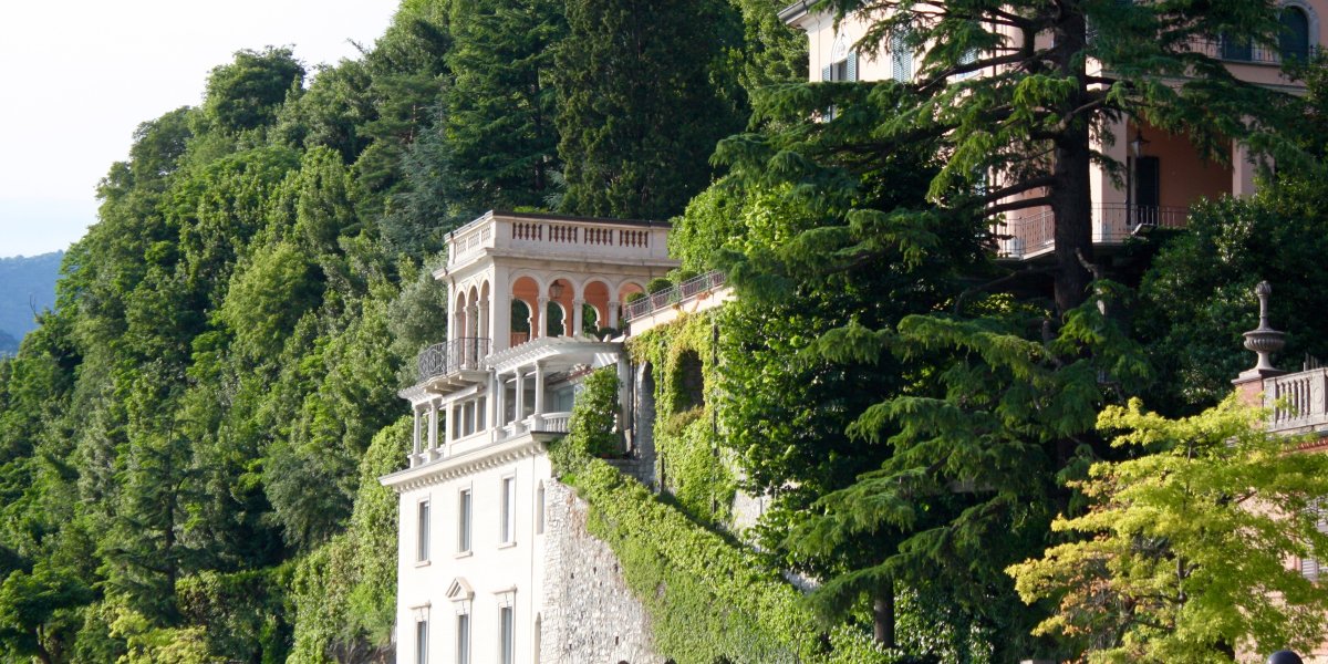 image of an Italian building with plants growing around it