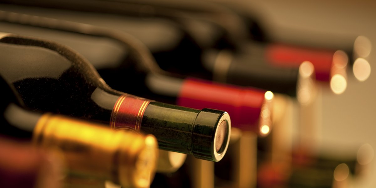 Collection of wine bottles in a wine rack.