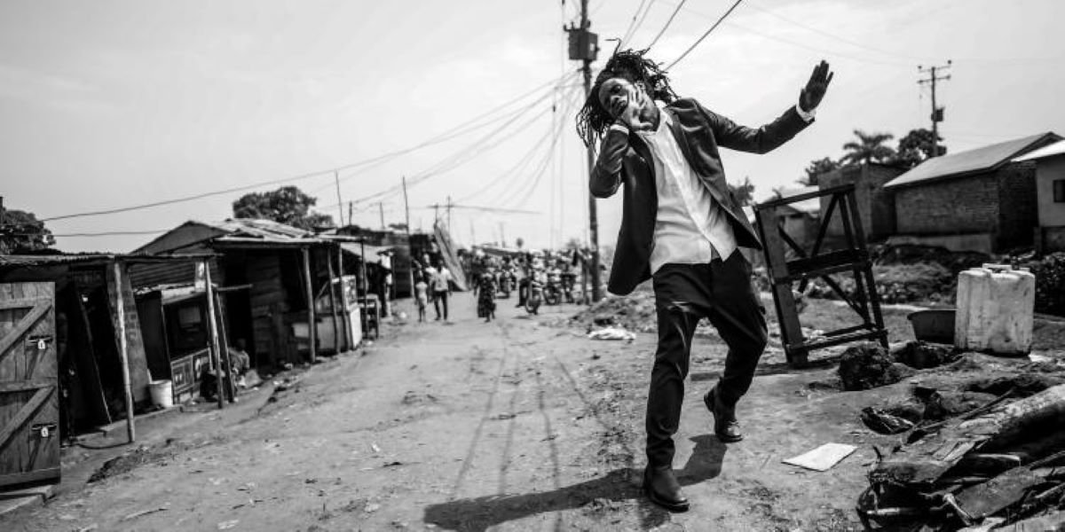 Image of a person dancing in the street