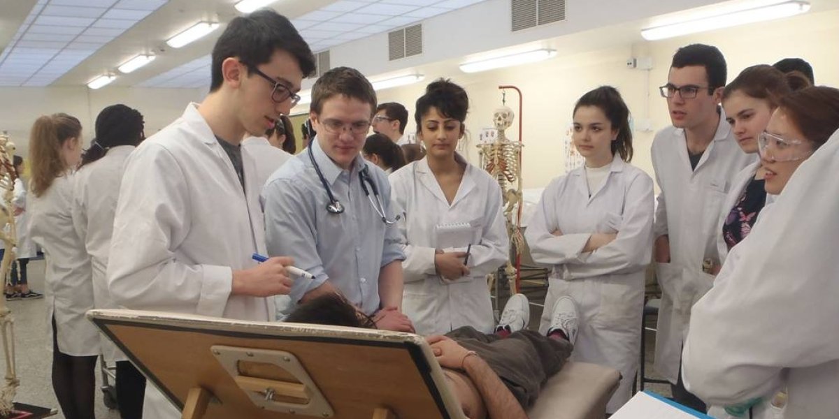 Pre-clinical students gather for a teaching session. Image Credit: Cecilia Brassett.