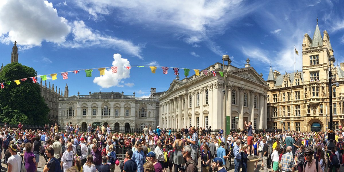 Crowds alongside the 2014 Tour de France course through Cambridge, past Senate House and King's College. 