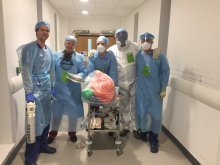 Dr Ivan Wong and team in full medical PPE