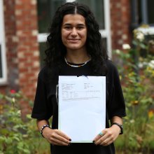 Hawa Dar holds her A-Level results