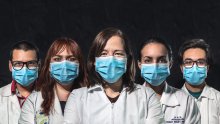 Karina Acevedo-Whitehouse and her team wearing face masks