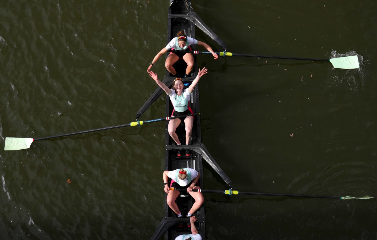 The Cambridge Women celebrate their victory.